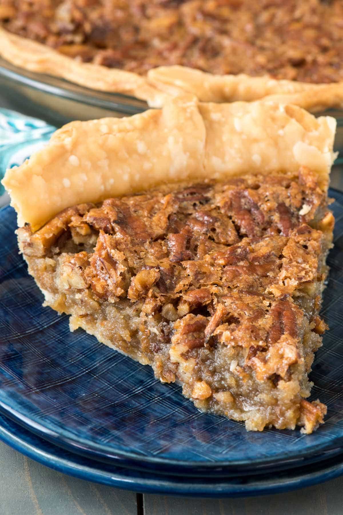 Brown Sugar Pecan Pie - this easy and fast pecan pie recipe has no corn syrup and is FULL of brown sugar. It's our family favorite and disappears in minutes every time I make it!