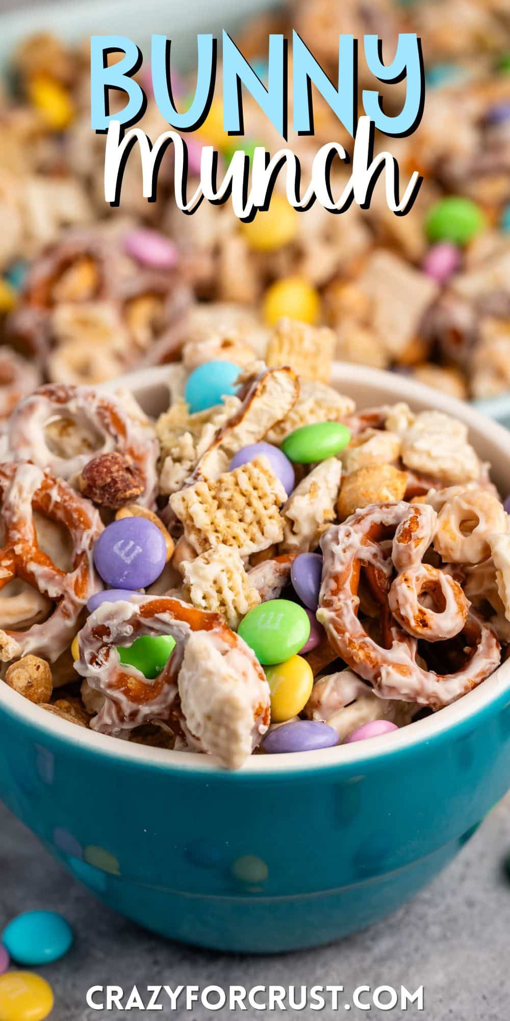 bunny munch mixed in a teal bowl with white chocolate with words on the image.