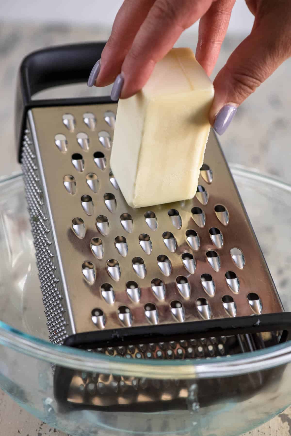 butter being grated.