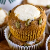 muffins with seeds and cream cheese in the center